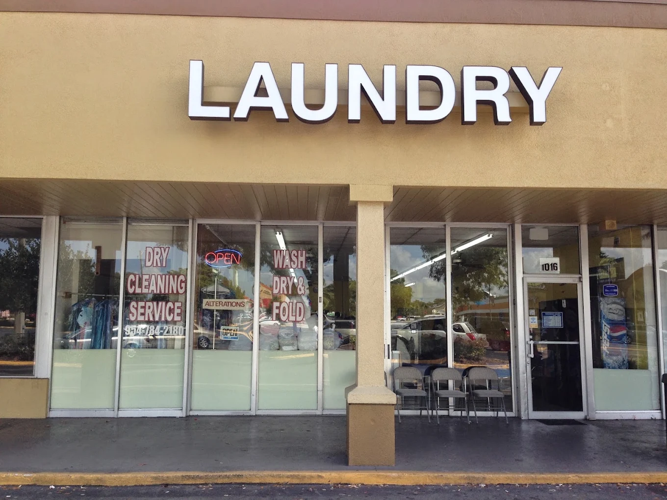 Sample Rd. Coin Laundry storefront